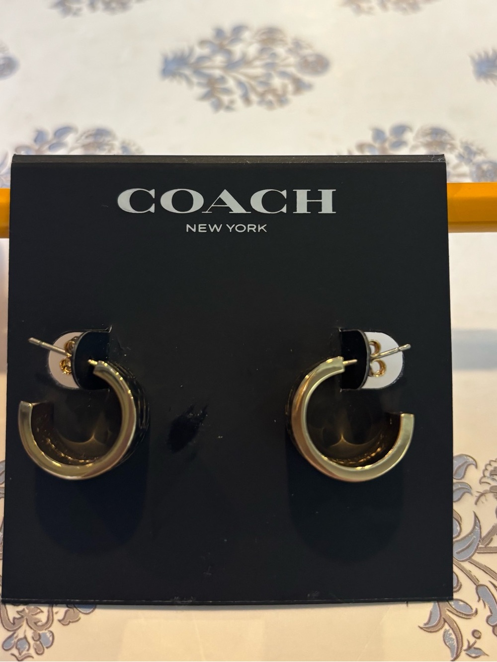 Coach designer earrings in EUC